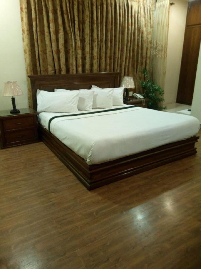 Hotel Grand ไฟซาลาบัด ภายนอก รูปภาพ