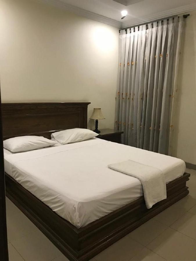 Hotel Grand ไฟซาลาบัด ภายนอก รูปภาพ